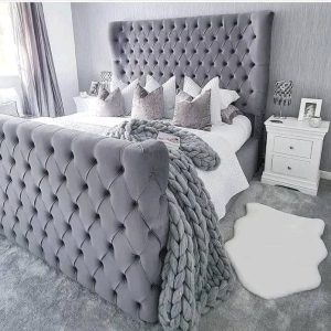 Velvet buttoned sleigh bed